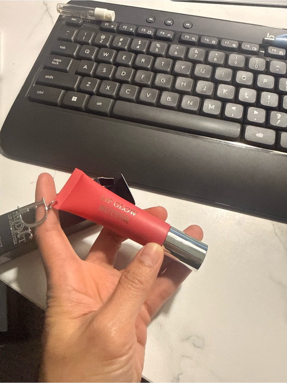 Dior Addict Lip Glow Butter in Navy and Silver Packaging